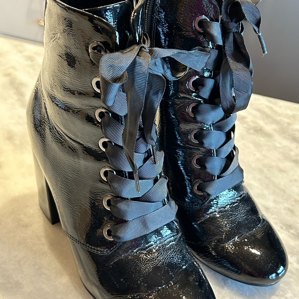 Super cute black ribbon laced Kenneth Cole Ladies Boots.